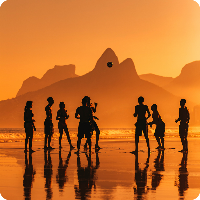 Football players silhouette at sunset